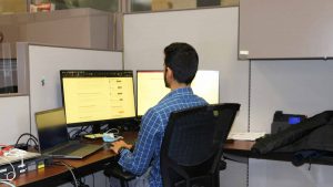 Lakeland Networks employee works at a computer